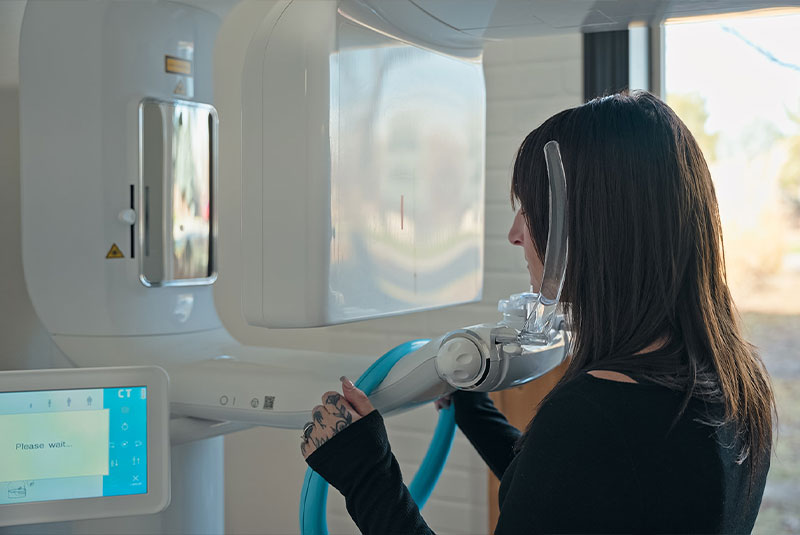Patient taking a dental x-ray