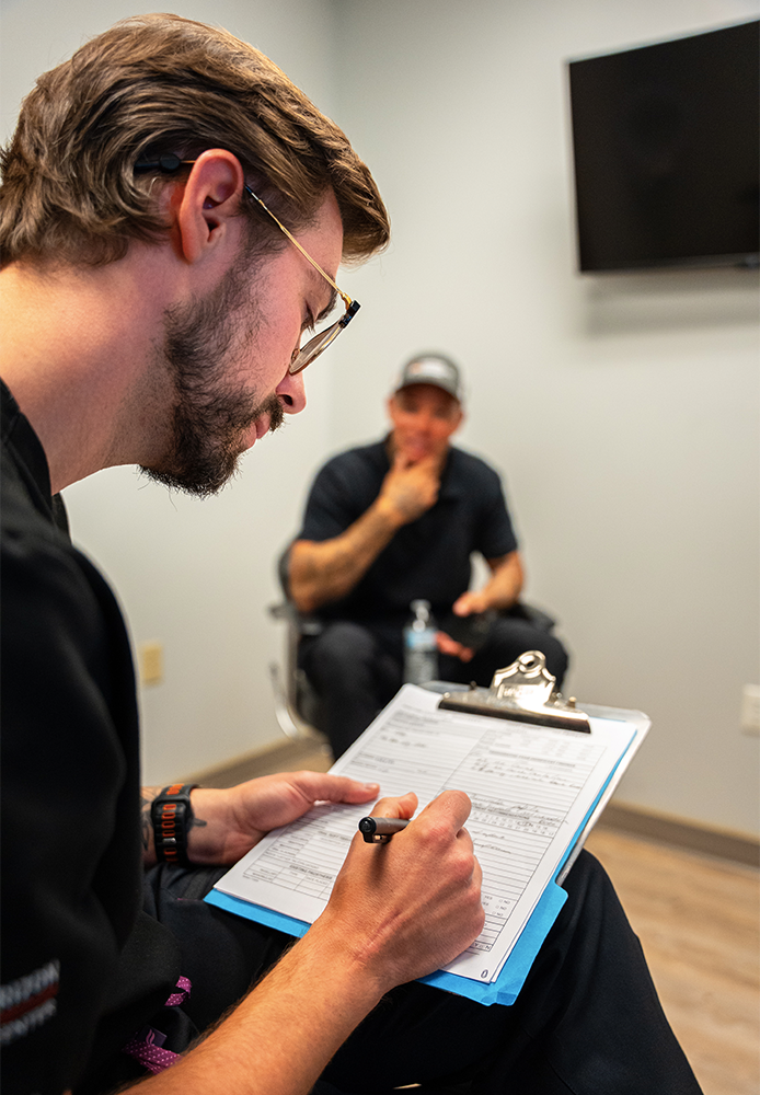 Dr. Stackowicz in a consultation with patient